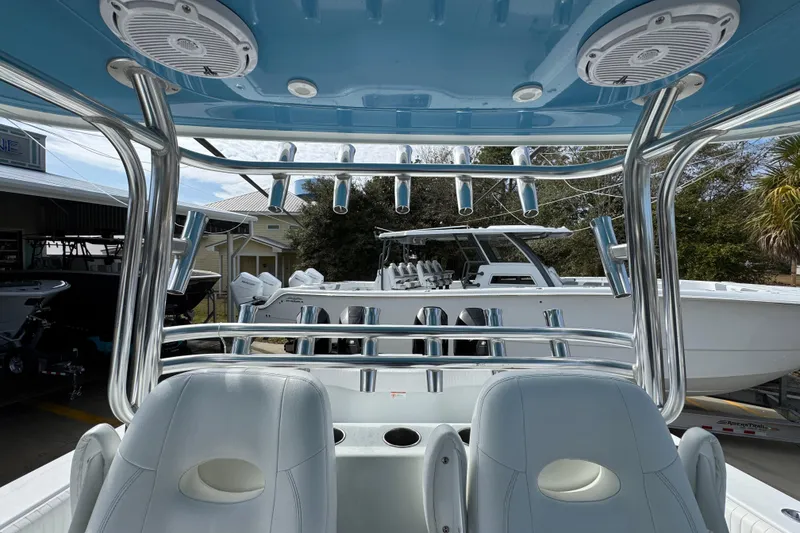 Slide: The Image of Interior view of a 2016 Freeman 37VH boat with seating and rod holders. - 30