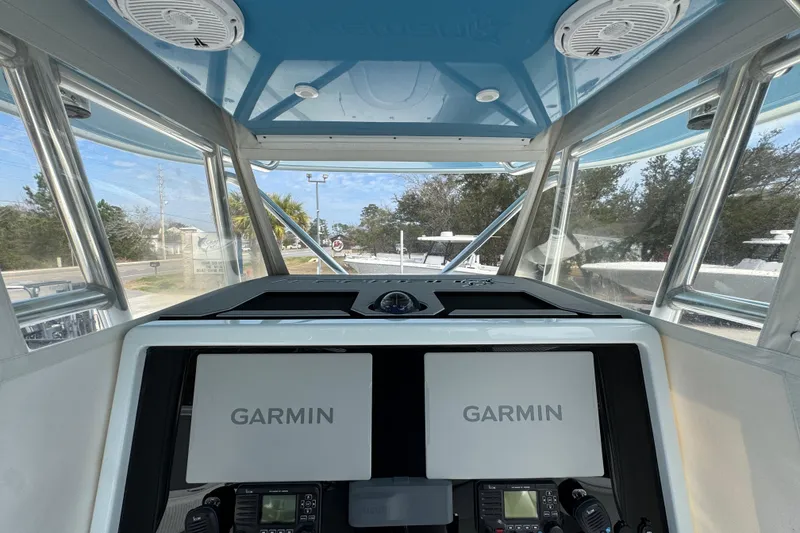 Slide: The Image of Interior view of a 2016 Freeman 37VH boat with Garmin navigation displays. - 33