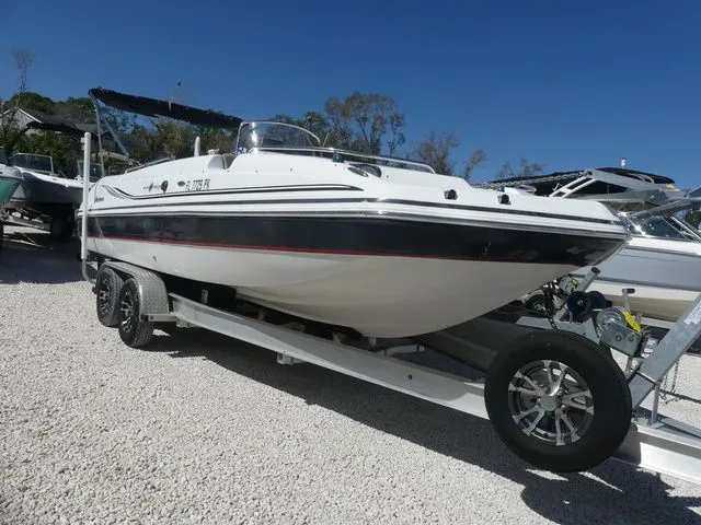 The Image of 2013 Hurricane SUNDECK SPORT SS 231 OB on trailer, side view. - 1