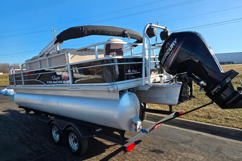 Slide: The Image of 2018 Sun Tracker Fishin' Barge 20 DLX pontoon boat with Mercury outboard motor. - 3
