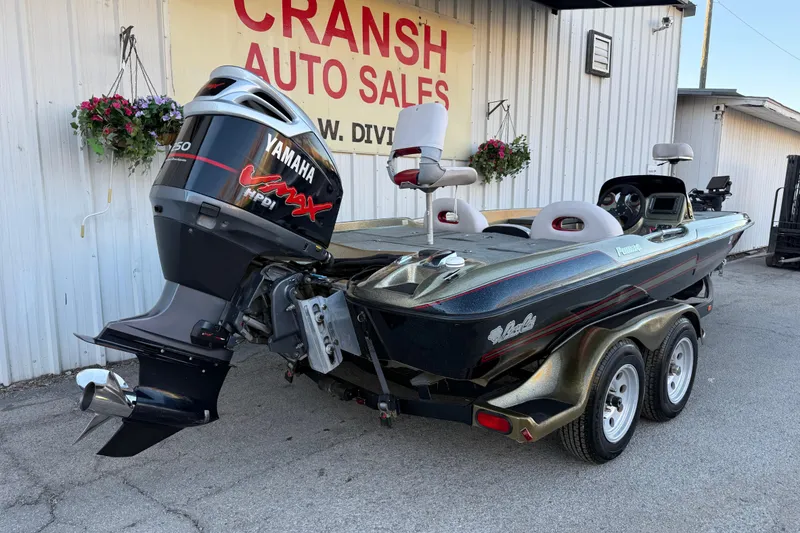Slide: The Image of 2005 Bass Cat Puma boat with Yamaha Vmax engine at Cransh Auto Sales. - 10