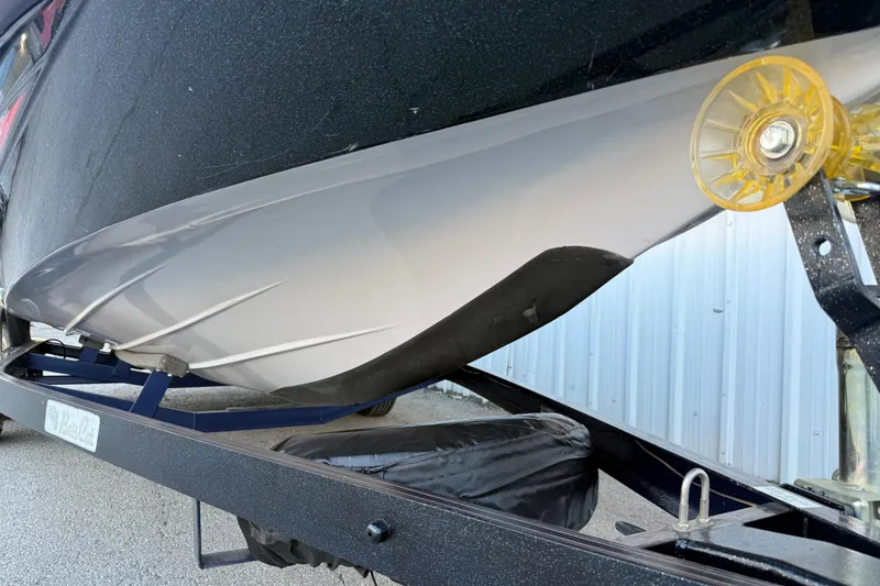 Slide: The Image of 2005 Bass Cat Puma boat hull on trailer, close-up view. - 31