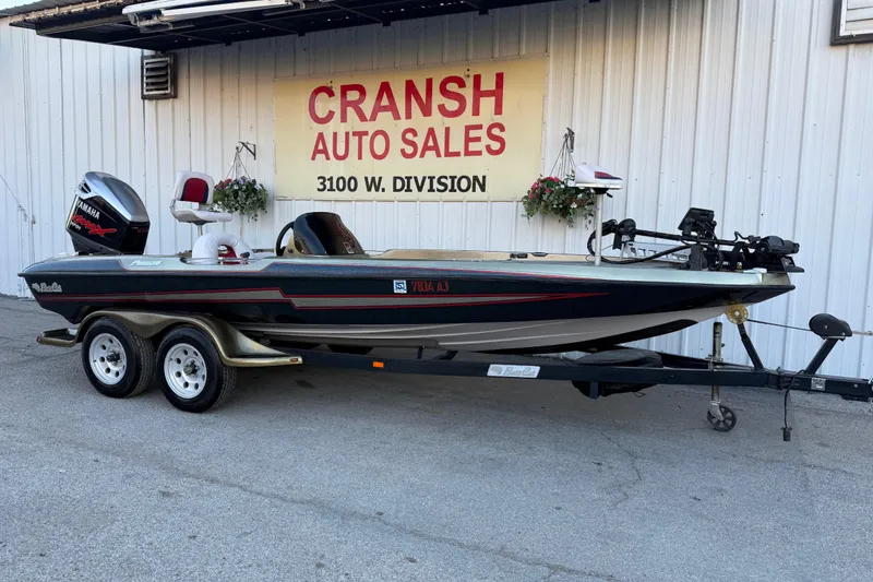 Slide: The Image of 2005 Bass Cat Puma boat on trailer at Cransh Auto Sales, 3100 W. Division. - 4