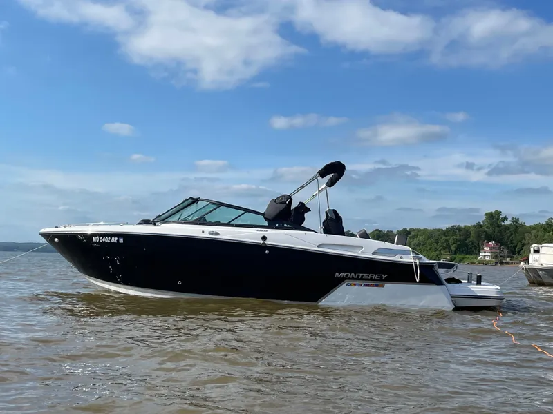 Slide: The Image of 2019 Monterey 258SS Super Sport boat on calm water. - 3