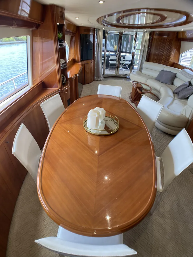 Slide: The Image of Luxurious interior of 1999 Azimut 85 Ultimate yacht with elegant wood and leather furnishings. - 16