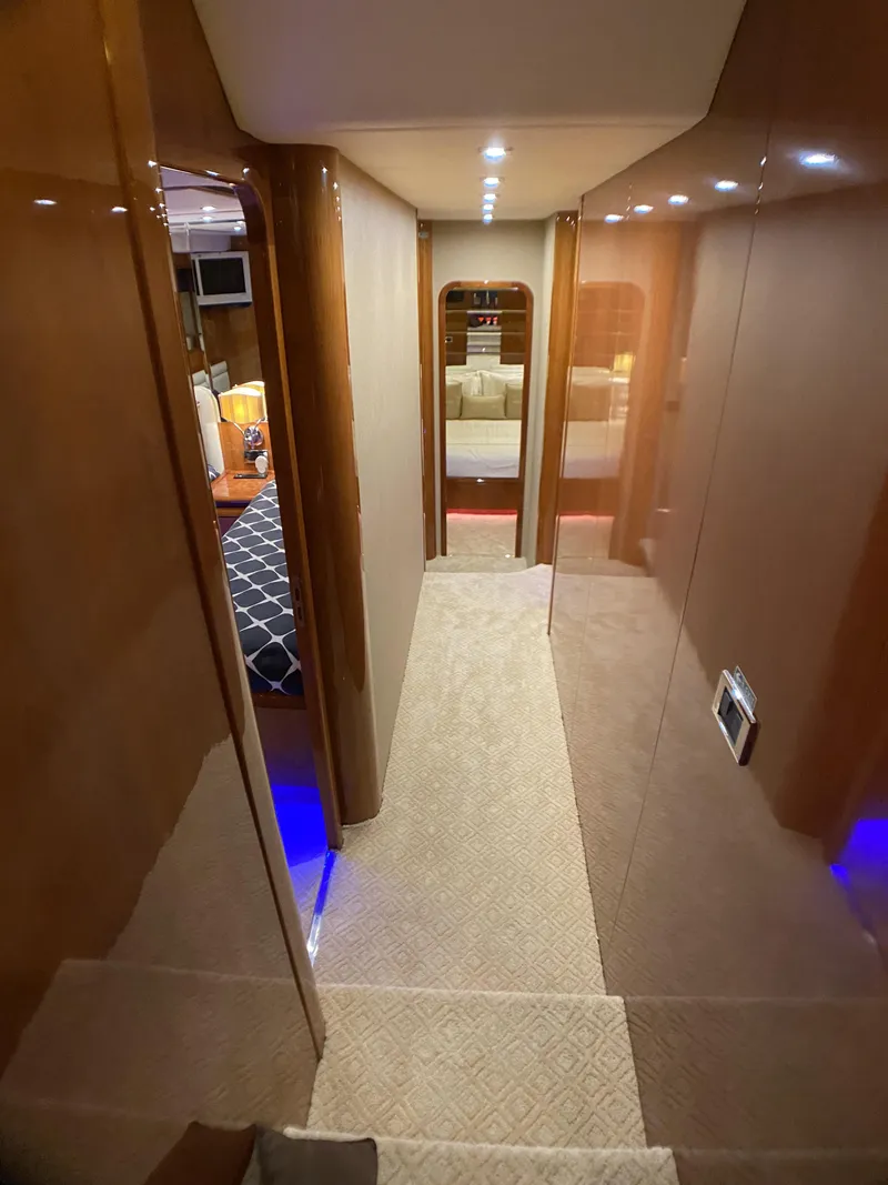 Slide: The Image of Bathroom interior of a 1999 Azimut 85 Ultimate yacht, featuring a toilet and sink. - 49