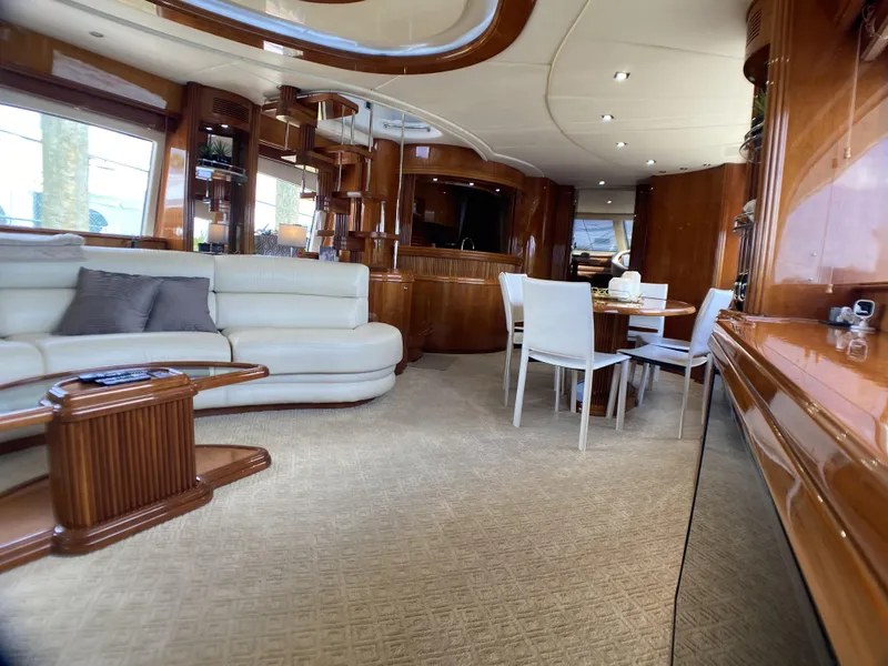 Slide: The Image of Luxurious interior of a 1999 Azimut 85 Ultimate yacht with elegant furnishings and panoramic windows. - 5