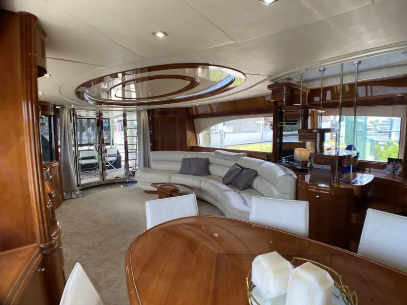 Slide: The Image of Luxurious interior of 1999 Azimut 85 Ultimate yacht with elegant wood finishes and modern design. - 9