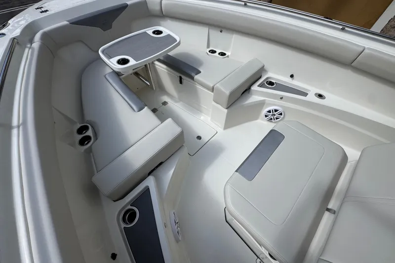 Slide: The Image of 2026 Sailfish 312 CC boat interior with seating and table, featuring modern design. - 19