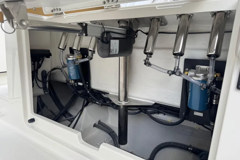 Slide: The Image of Interior view of 2026 Sailfish 312 CC boat's hydraulic system and components. - 25