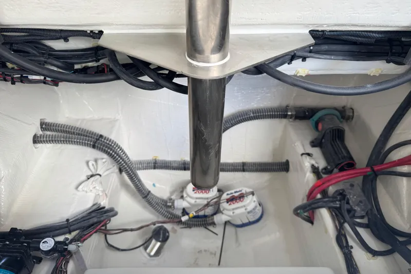 Slide: The Image of Interior view of 2026 Sailfish 312 CC boat wiring and plumbing system. - 26