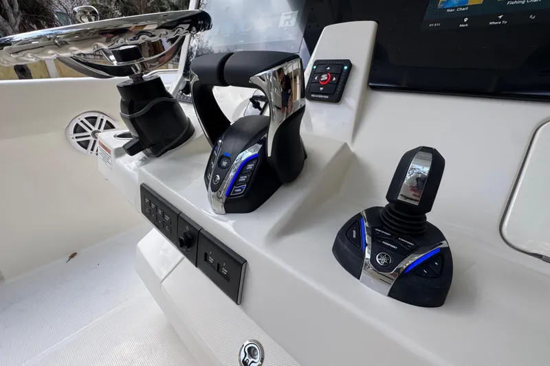 Slide: The Image of Control panel of 2026 Sailfish 312 CC boat with advanced navigation features. - 9