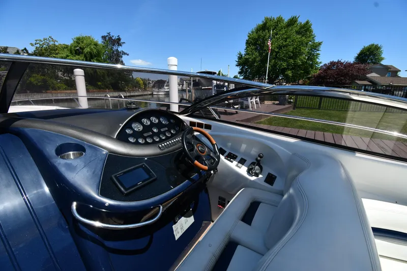 Slide: The Image of Dashboard of a 2000 Sunseeker Superhawk 34 with Garmin navigation system. - 11