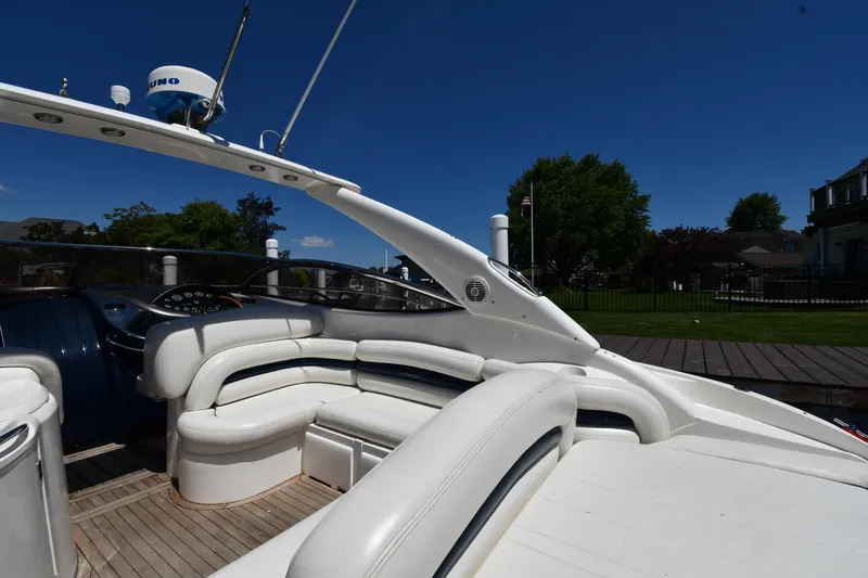Slide: The Image of Sunseeker Superhawk 34, 2000 model, featuring luxurious white interior. - 19