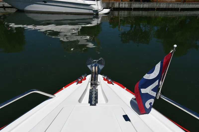 Slide: The Image of Bow of a 2000 Sunseeker Superhawk 34 boat on water. - 5