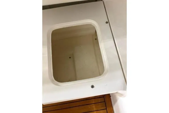 Slide: The Image of Storage compartment on a 2000 Sunseeker Superhawk 34 yacht. - 59