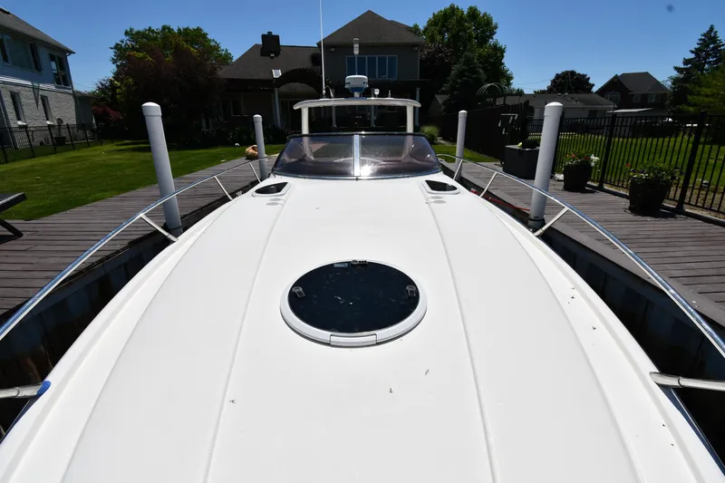 Slide: The Image of 2000 Sunseeker Superhawk 34, front view on a dock. - 6