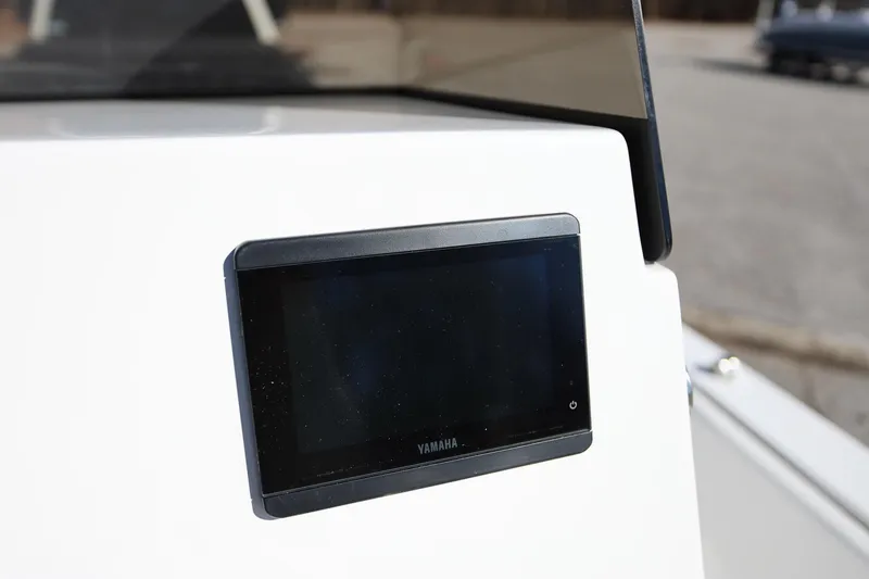 Slide: The Image of Yamaha display on 2025 Stingray 173 CC boat dashboard, close-up view. - 16