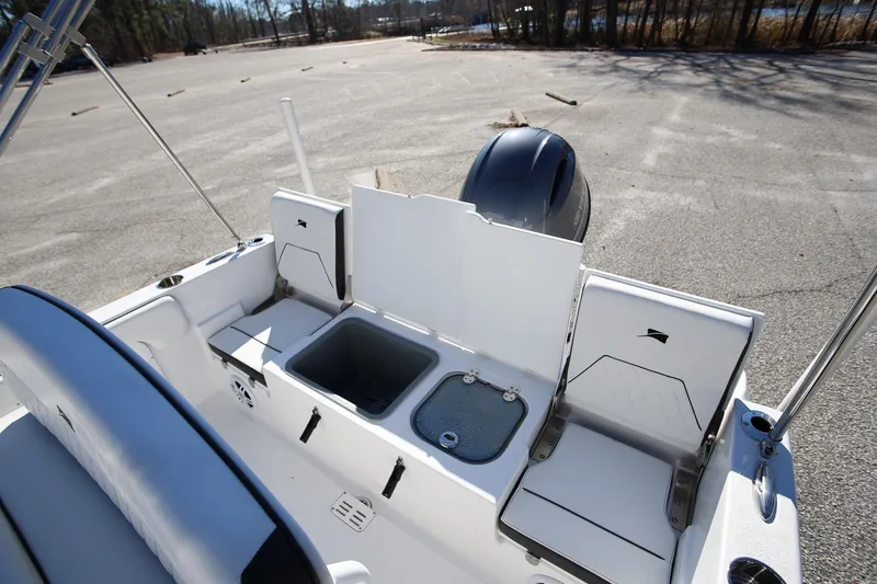 Slide: The Image of 2025 Stingray 173 CC boat interior with seating and storage compartments. - 8