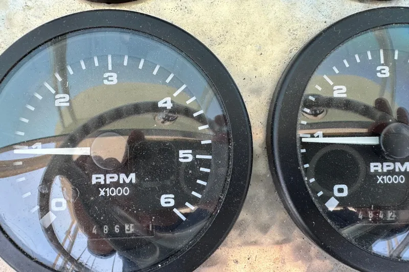 Slide: The Image of Close-up of RPM gauges on a 1973 Bertram 31 Flybridge Cruiser. - 28