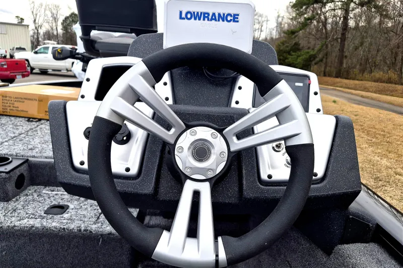 Slide: The Image of Steering wheel of 2026 Tracker Pro Team 190 boat with Lowrance electronics. - 11