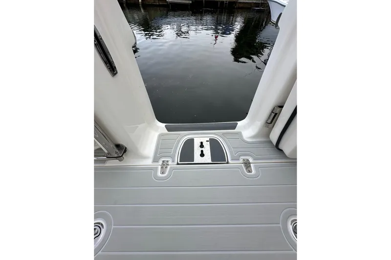 Slide: The Image of 2020 Boston Whaler 330 Outrage boat deck with water view. - 20