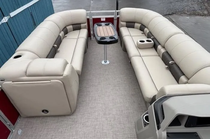 Slide: The Image of 2025 Sun Tracker Party Barge 24 DLX with spacious seating and central table. - 6