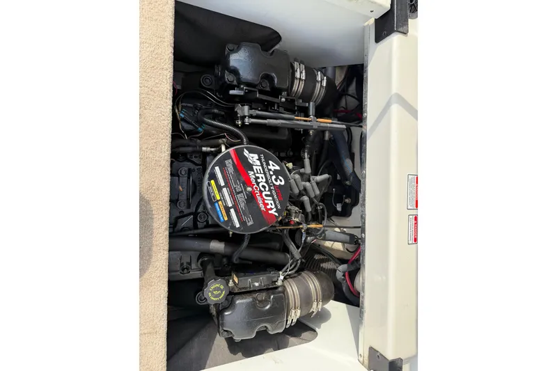 Slide: The Image of Engine compartment of a 2003 Sea Ray 185 Bow Rider with Mercury 4.3L engine. - 19