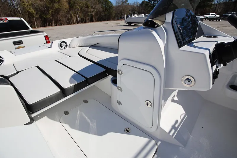 Slide: The Image of 2025 Stingray 192 SC boat interior with seating and storage compartments. - 18