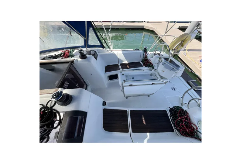 Slide: The Image of Cockpit of 2017 Jeanneau Sun Odyssey 419 sailboat, featuring seating and winches. - 15