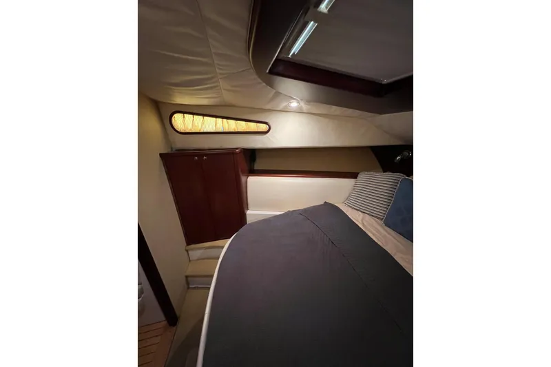 Slide: The Image of Luxurious cabin interior of 2007 Chris-Craft Roamer 40 yacht with cozy bedding. - 35