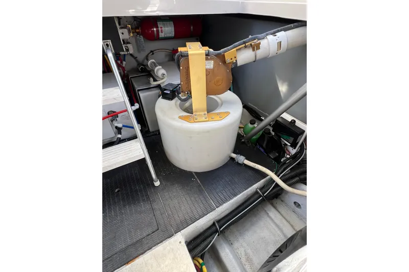 Slide: The Image of Engine room of 2007 Chris-Craft Roamer 40 with visible components and wiring. - 44