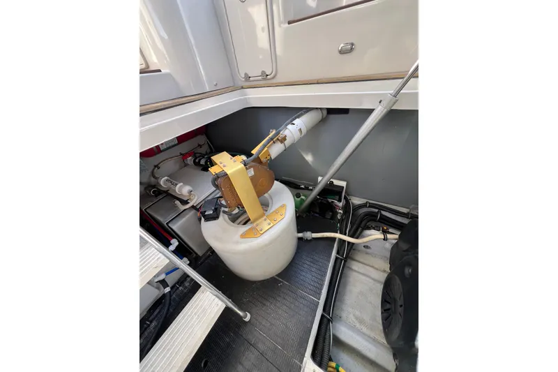 Slide: The Image of Engine room of 2007 Chris-Craft Roamer 40 with ladder and equipment. - 50