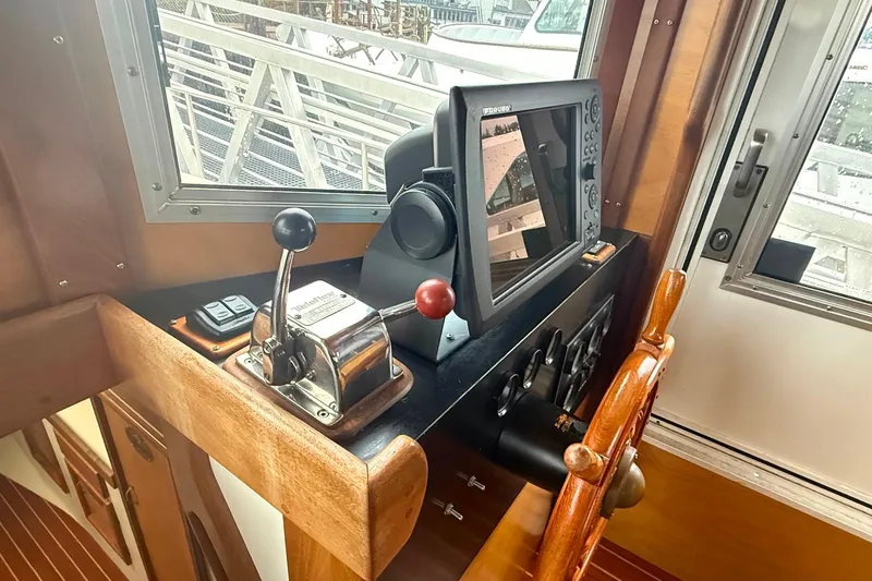 Slide: The Image of Control panel of a 1996 Devlin 38 boat with navigation equipment. - 18