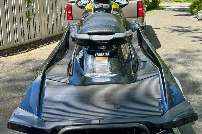 Slide: The Image of 2015 Yamaha WaveRunner VXR parked on driveway, rear view. - 2