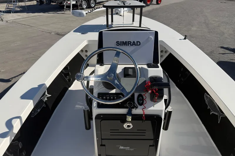 Slide: The Image of 2016 Maverick Mirage 18 HPX-V boat interior with Simrad navigation system. - 12