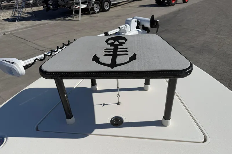 Slide: The Image of 2016 Maverick Mirage 18 HPX-V boat with anchor design on deck platform. - 14