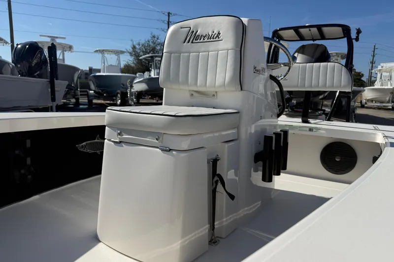 Slide: The Image of 2016 Maverick Mirage 18 HPX-V boat interior with white seating and console. - 7