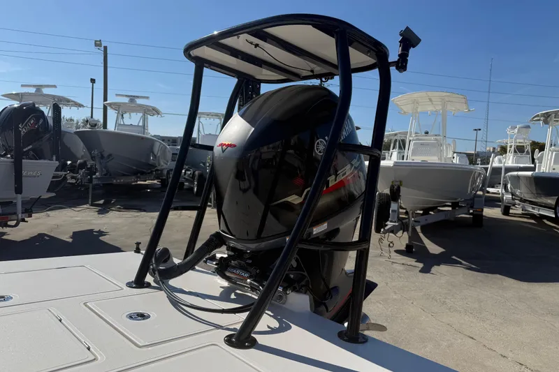 Slide: The Image of 2016 Maverick Mirage 18 HPX-V boat with Yamaha outboard motor in a marina. - 9