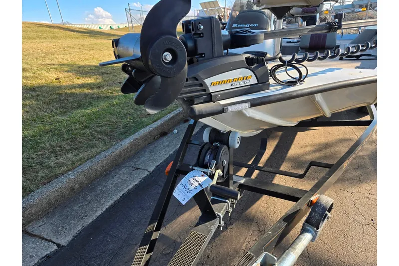 Slide: The Image of 2002 Ranger 116 Cherokee boat with Minn Kota Terrova motor on trailer. - 7