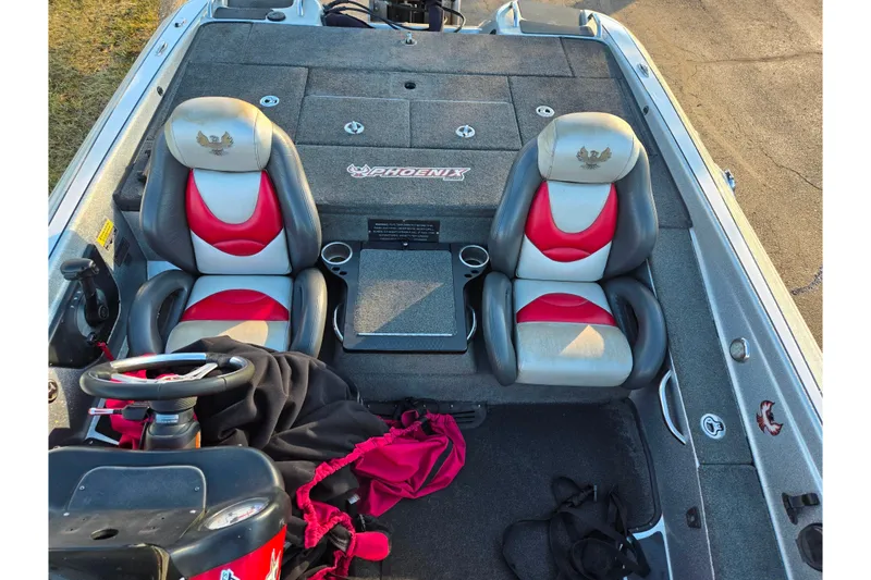 Slide: The Image of 2015 Phoenix 819 Pro boat interior with dual seats and steering wheel. - 19