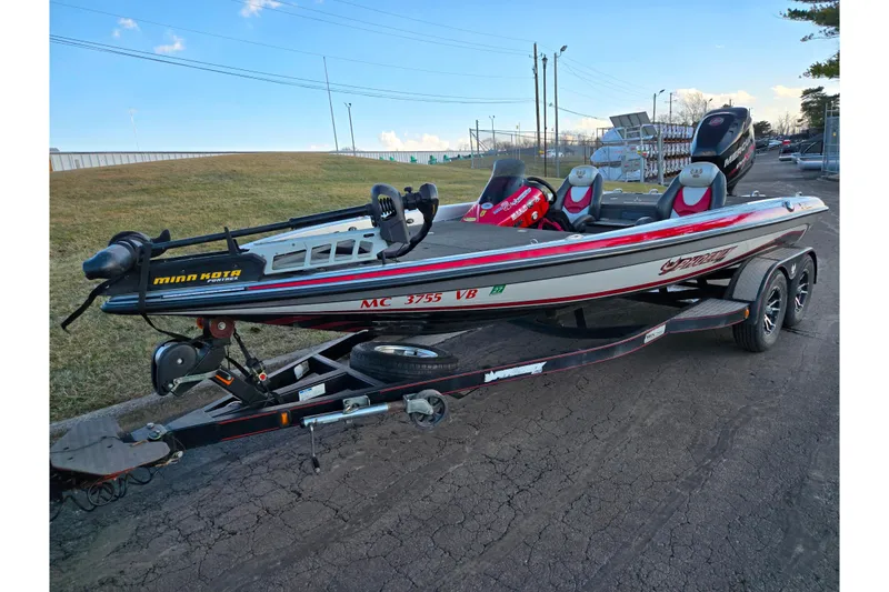 Slide: The Image of 2015 Phoenix 819 Pro fishing boat on trailer, featuring Minn Kota trolling motor. - 6