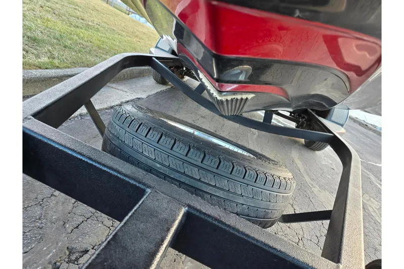 Slide: The Image of 2015 Phoenix 819 Pro boat on trailer with spare tire underneath. - 8