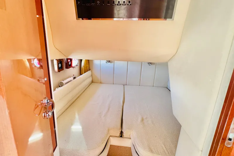 Slide: The Image of Luxurious interior of 2007 Windy Typhoon 43 yacht with plush seating and nautical decor. - 17