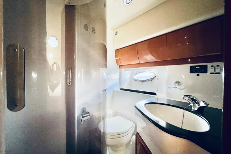 Slide: The Image of Cozy cabin interior of 2007 Windy Typhoon 43 yacht with twin beds and soft lighting. - 22