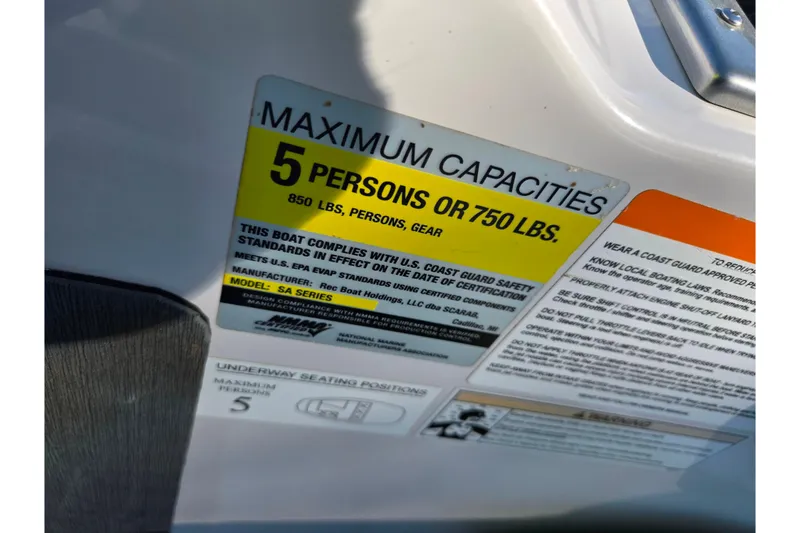 Slide: The Image of Capacity label on 2015 Scarab 165 H.O. Impulse, limits 5 persons or 750 lbs. - 12