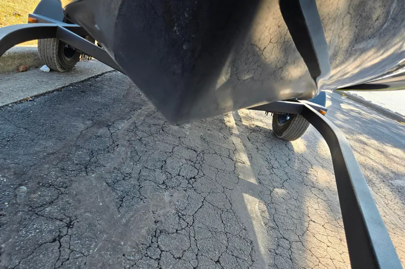 Slide: The Image of 2015 Scarab 165 H.O. Impulse boat on trailer, viewed from underneath. - 7