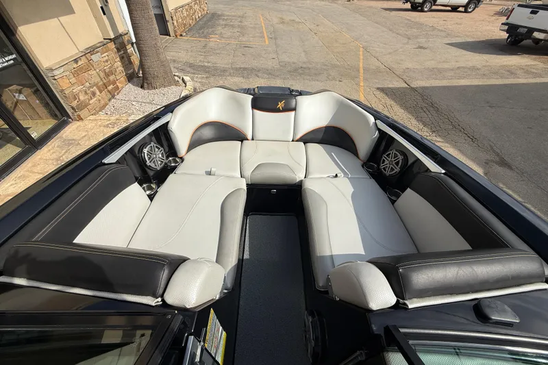 Slide: The Image of 2017 MasterCraft X46 boat interior with spacious seating and modern design. - 13