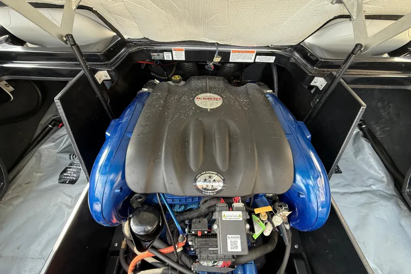 Slide: The Image of 2017 MasterCraft X46 engine compartment with Ilmor engine, showcasing detailed components. - 15