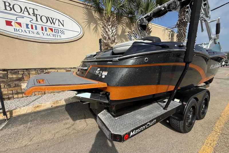 Slide: The Image of 2017 MasterCraft X46 boat on trailer at Boat Town dealership. - 4